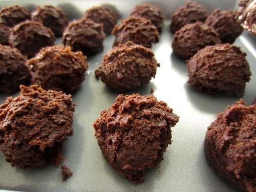 Chocolate cake balls on a baking sheet