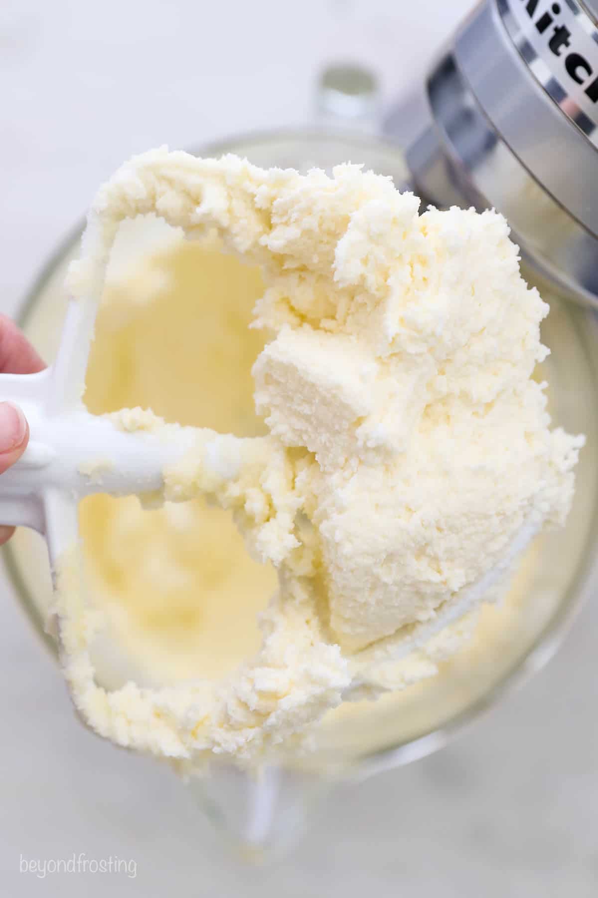 The butter and sugar being mixed together.
