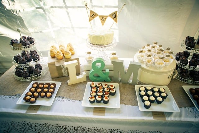 A table of DIY wedding cupcakes