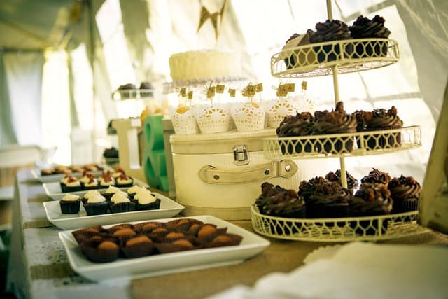 Close-up of a table of wedding cupcakes