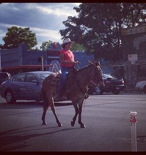 A woman on horseback at the BlogHer 2013 conference.