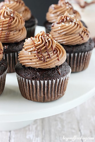 Close-up of double chocolate cupcakes on a cake stand