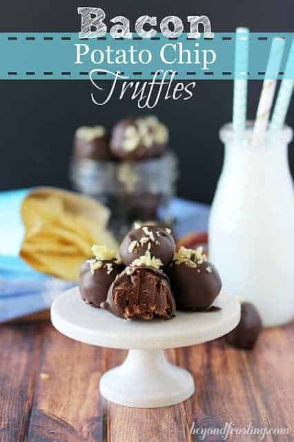 Bacon Potato Chip Truffles piled on a cake stand next to a glass of milk
