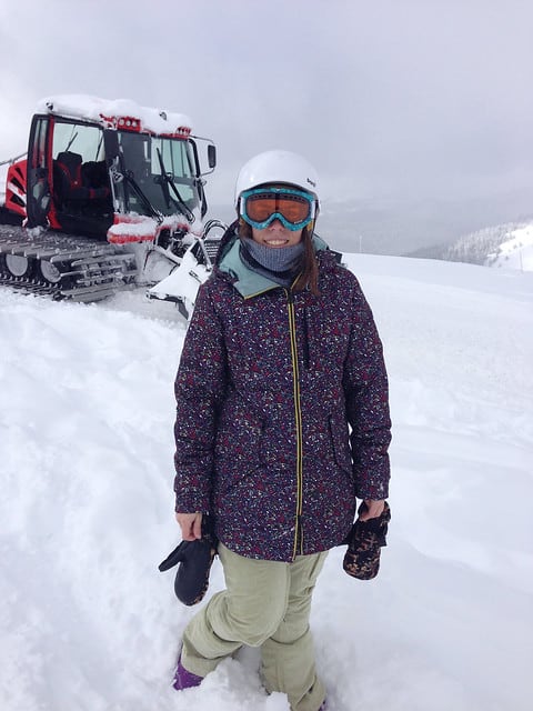 Author in front of a snowcat machine