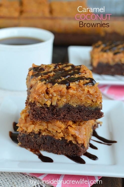 A Stack of Two Caramel Coconut Brownies Next to a Cup of Coffee