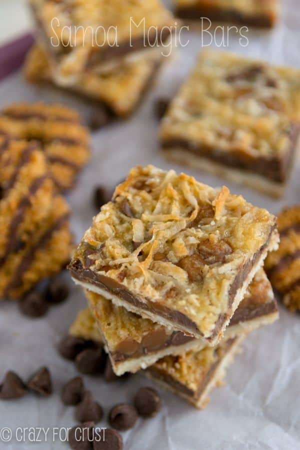 A Stack of Samoa Bars on a Piece of Parchment Paper with Chocolate Chips