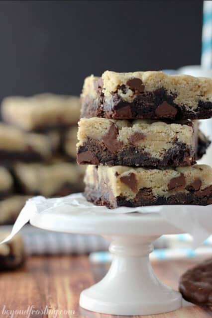 A stack of thin mint brookies on a cake stand