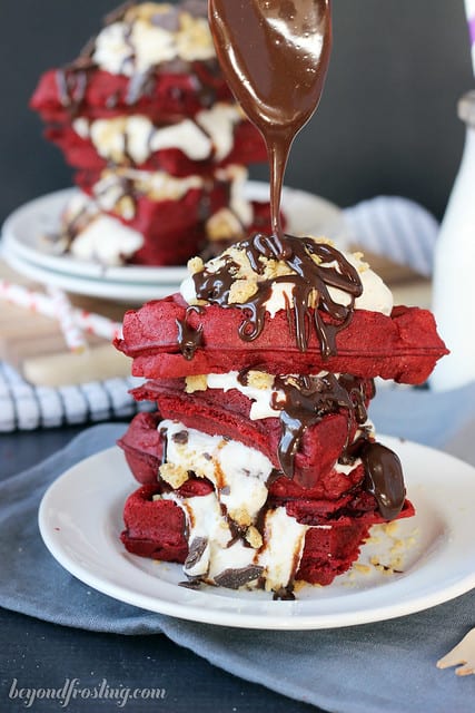 Red Velvet S'mores Waffles stacked on a plate