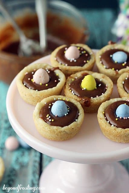 Overhead view of Cadbury Ganache Cookie Cups on a cake stand
