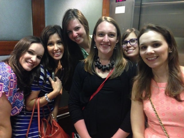 Food bloggers posing in the elevator in Miami
