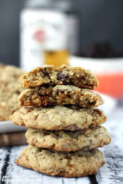 Bourbon Salted Caramel Oatmeal Cookies stacked with two halves on top