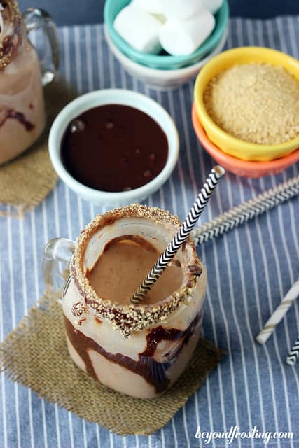 Overhead view of a partially-consumed Bourbon Toasted Smores Milkshake in a mason jar