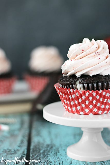 Close-up of Chocolate Strawberry Cheesecake Cupcake on a cake stand