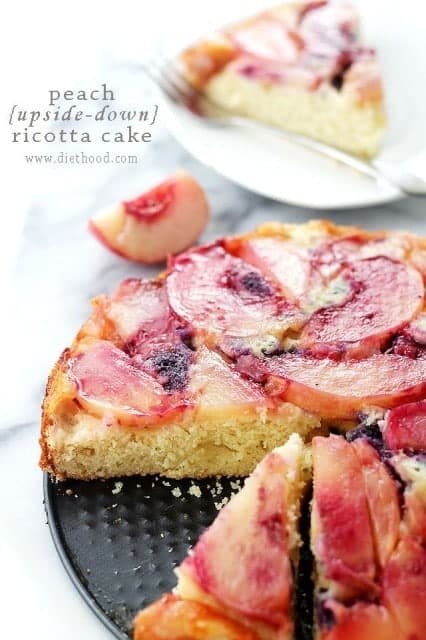 Peach Upside Down Ricotta cake with a slice removed