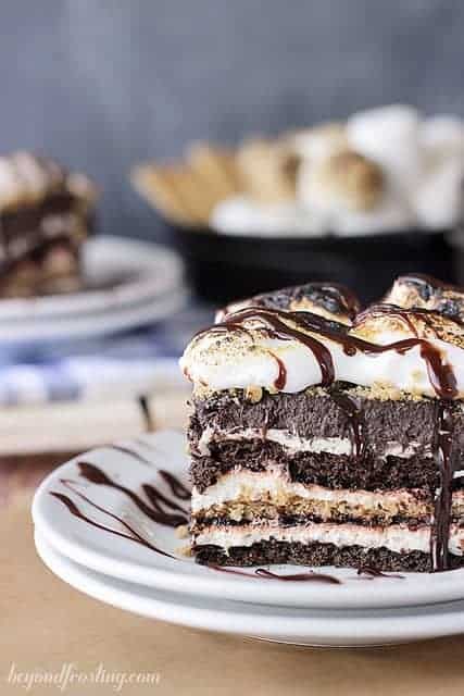 This S'mores Lasagna Cake is such a fun icebox cake, every layer in a new surprise. Layers of graham cracker, chocolate whipped cream, toasted marshmallow mousse and pudding. It's all topped with more toasted marshmallows! Try this no-bake icebox cake today!