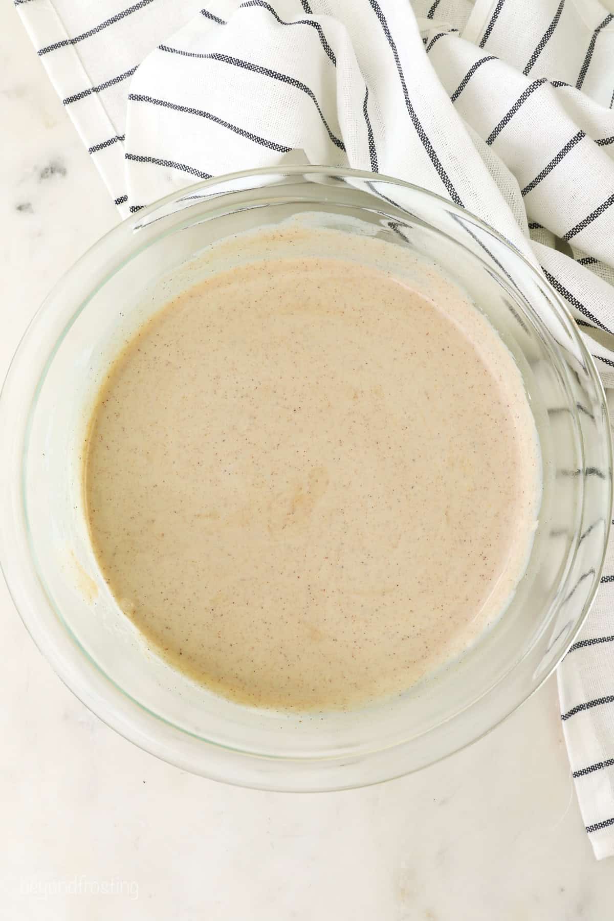 Sweet potato ice cream base in a large glass bowl.