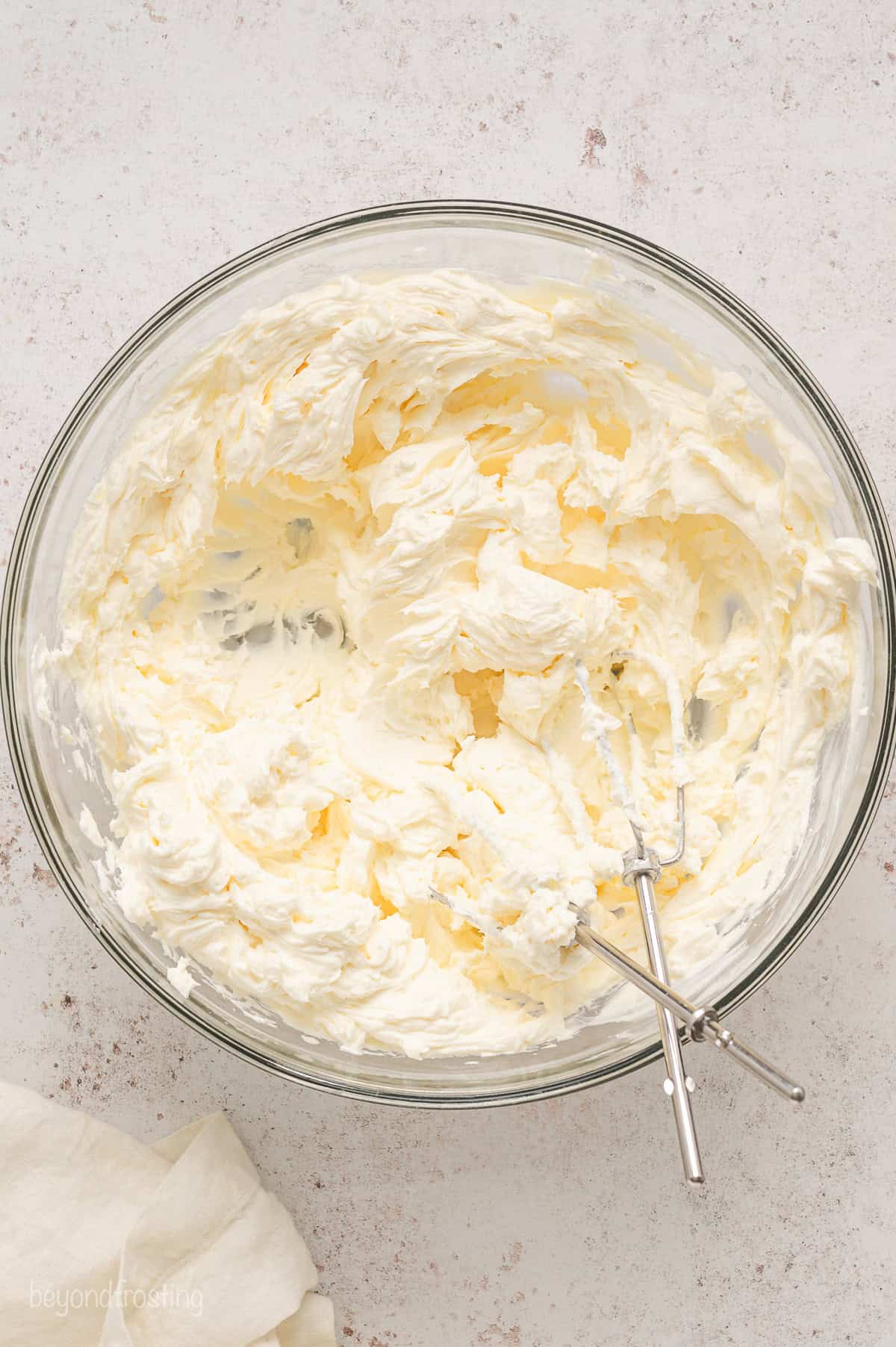 Whipped cream cheese in a large bowl.