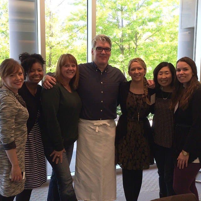 Food bloggers posing with Chef Peacott