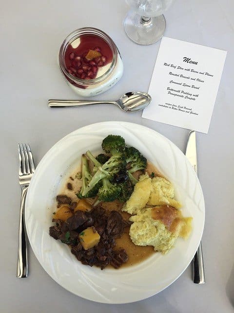 Overhead view of a plate of food and a menu from a BHG food demonstration