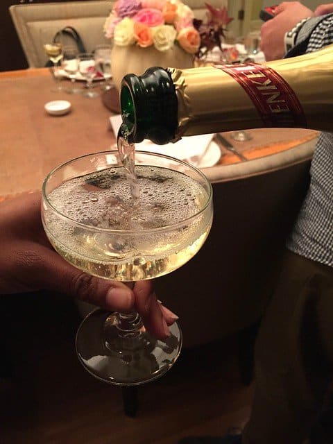 Champagne being poured into a glass