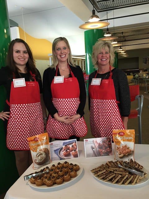 Three ladies posing with treats made from Betty Crocker mixes