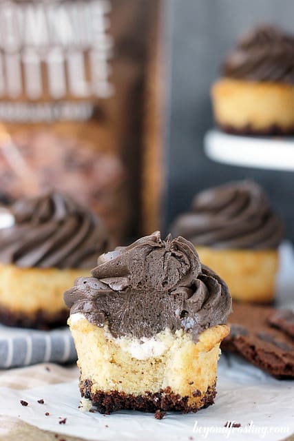 Side view of a Brownie Brittle Smores Cupcake with a bite removed