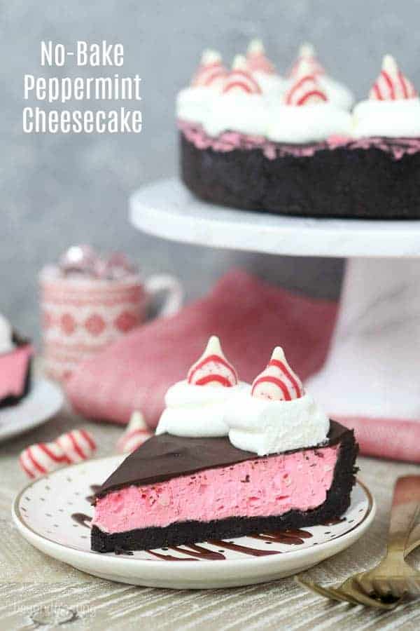 This No-Bake Peppermint Cheesecake starts with a thick Oreo crust. The filling is made from cream cheese, Cool Whip and Hershey’s Candy Cane Kisses. It is topped off with a soft chocolate glaze and a dollop of whipped cream.