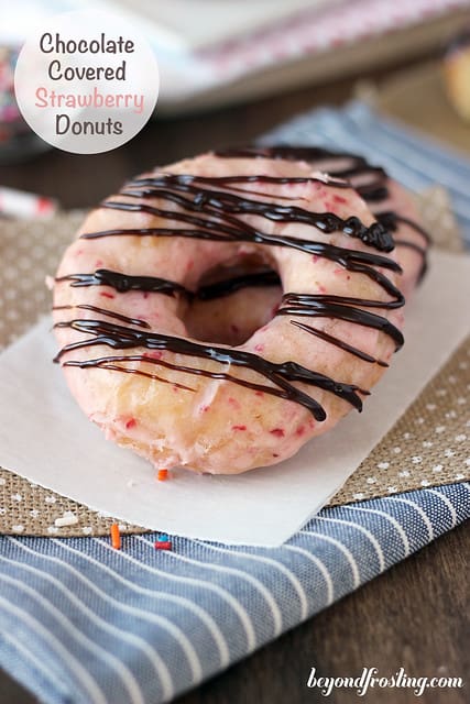 Overhead view of a Chocolate Covered Strawberry Donut on a napkin