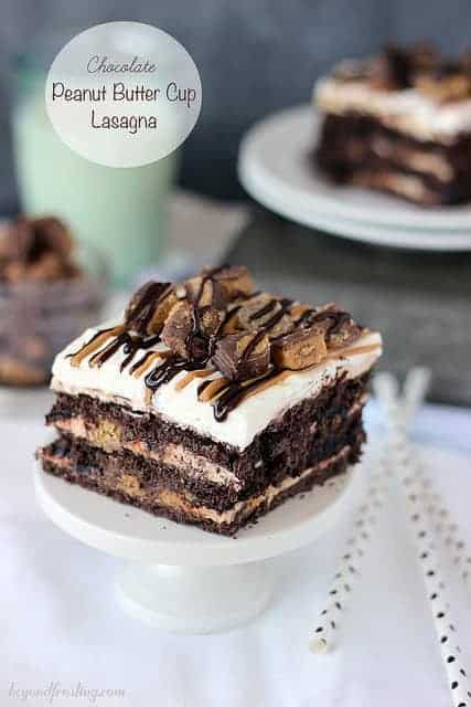 A serving of Chocolate Peanut Butter Cup Lasagna on a mini cake stand