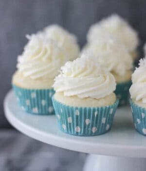 These Coconut Cream Pie Cupcakes are the perfect combination of coconut cake with a lightly sweetened coconut mousse and topped with a cream cheese whipped cream.