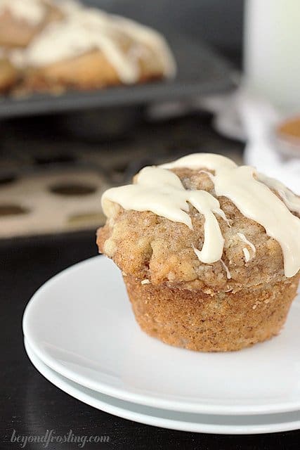 Cinnamon Roll Muffin with icing on a plate