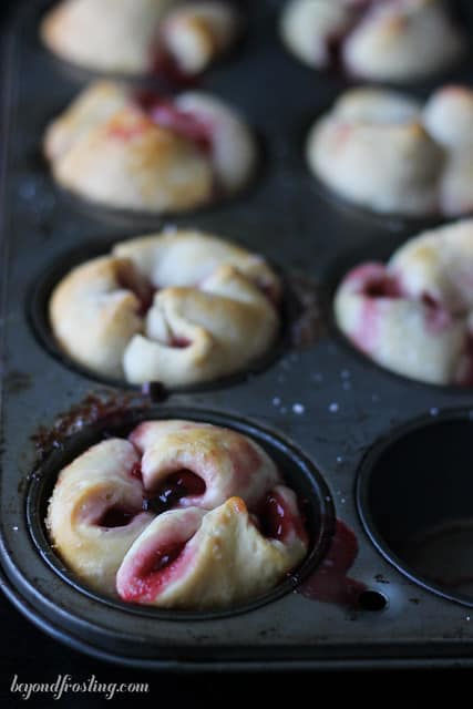 Overhead view of Chocolate Cherry Monkey Bread Muffins in a muffin tin