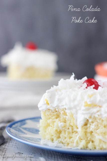 A Pina Colada Poke Cake is such a refreshing dessert! This rum spiked vanilla cake is drenched in sweetened condensed milk and topped fresh pineapple and coconut whipped cream.