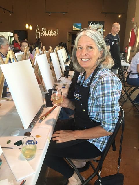 Blog author's mom at a Paint and Sip event