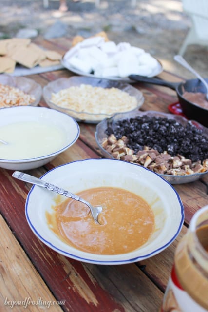 A variety of toppings and sauces for DIY S'mores Fondue