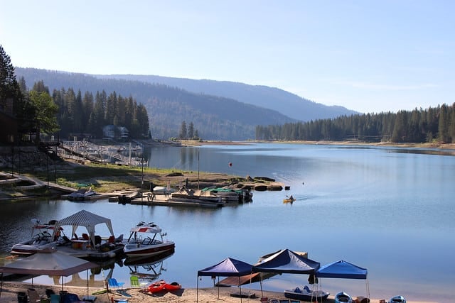 Scenery at Bass Lake with boats and pop-up tents