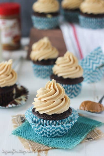Sink your teeth into these Biscoff Cheesecake Cupcakes! Chocolate cheesecake cupcakes with a Biscoff cream cheese frosting