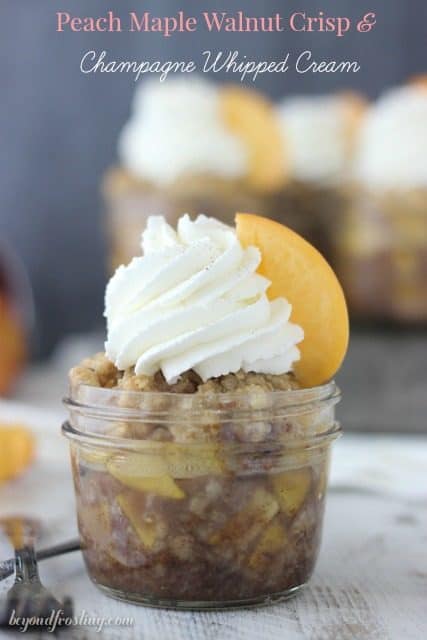 This Peach Maple Walnut Crisps with Champagne Whipped Cream are perfect for summertime. The peaches are soaked in maple syrup, brown sugar and cinnamon and layered with a brown sugar streusel. 