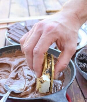 DIY S'mores Fondue Party. You don't need anything fancy to make this happen! Grab your s'mores essentials, some melted chocolate and your favorite toppings for dunking.