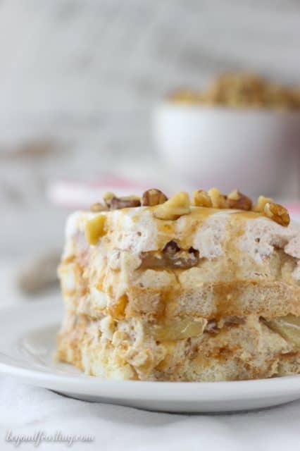 This Apple Pie Tiramisu is layered with ladyfingers soaked in bourbon, spiced mousse, apple pie spice whipped cream and apple pie filling. 