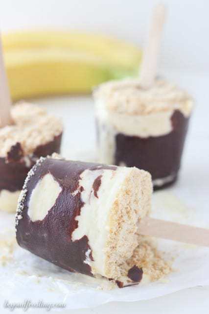 These Banana Cream Pie Popsicles are a banana flavored custard pudding pop with a Nilla wafer crust.