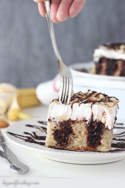 Best ever Banana Cream Pie Poke Cake filled with chocolate pudding