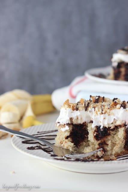 Best ever Banana Cream Pie Poke Cake filled with chocolate pudding