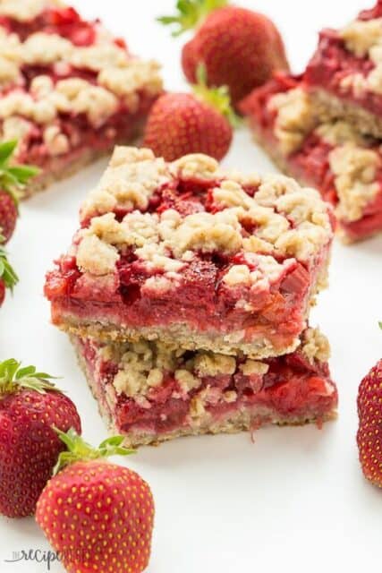 An oatmeal cookie base topped with strawberries and rhubarb and topped with more oatmeal cookie topping -- your favorite summer dessert is now a packable treat or back to school snack!