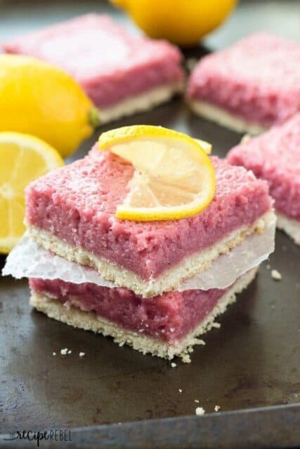 Strawberry Pineapple Lemonade Bars: A fruity, juicy filling on a buttery shortbread crust -- the perfect dessert for Spring or Summer! Change up the juices and fruits to suit your tastes, or use what you have!