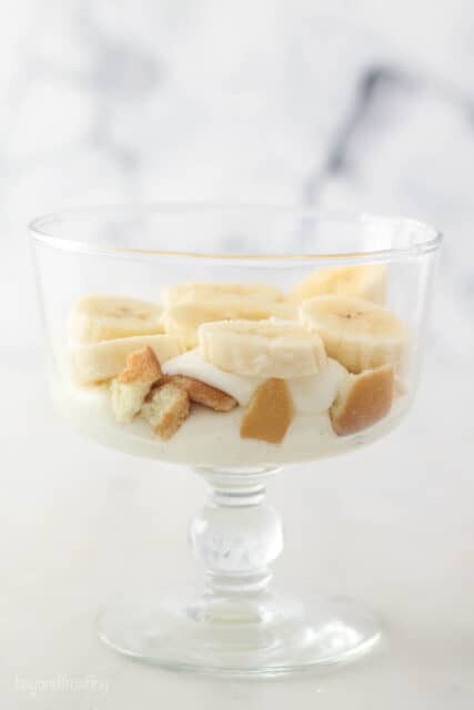 Banana slices on top of cookie pieces and mousse