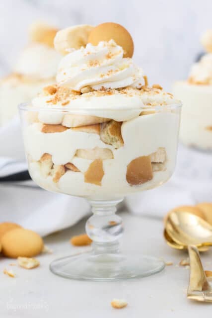 Three banana puddings in trifle glasses