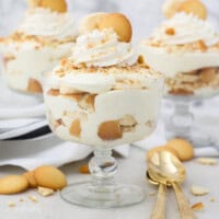 Three banana puddings in trifle glasses
