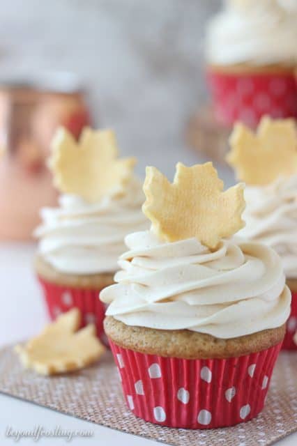 Spiced Cupcakes with gold leaf cupcake toppers made with fondant. This technique is SO easy! See the full tutorial at beyondfrosting.com