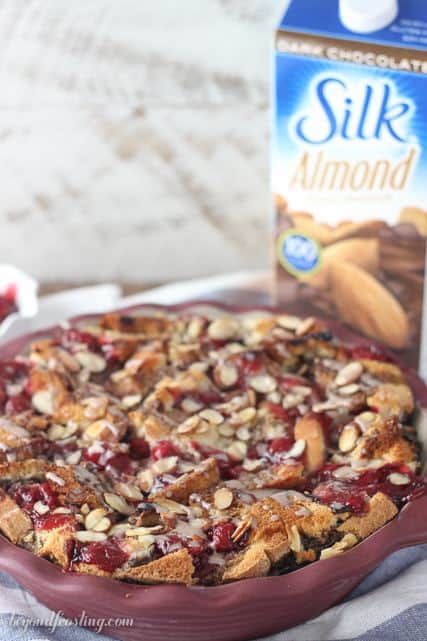 This Chocolate Almond Cherry Bread Pudding is baked to perfection with layers of chocolate almond milk-soaked bread, cherry pie filling and sprinkled with sliced almonds.